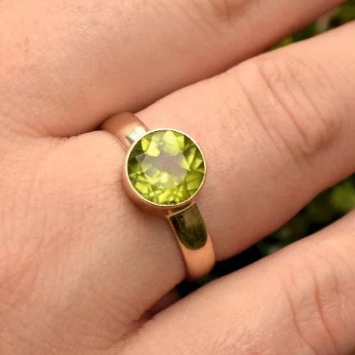 Natural Round Cut Peridot Bezel Set Solitaire Rings